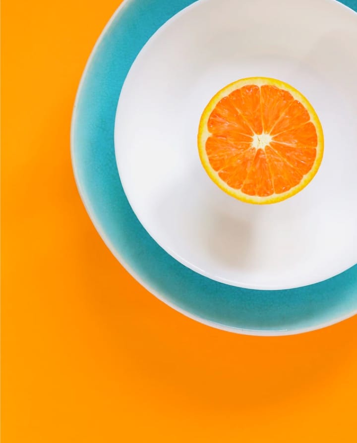 split orange on a blue background