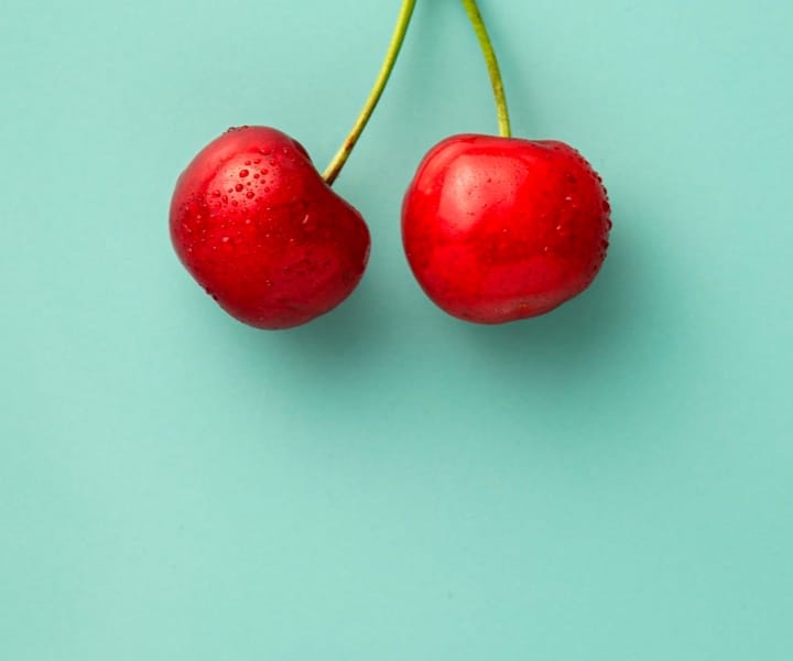 red apples in a blue background
